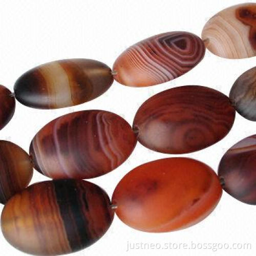 Banded brown oval-shaped semi precious agate gemstone, beads strand, matte finished